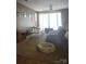Cozy living room with soft, neutral tones, offering a relaxing atmosphere for unwinding and comfort at 3944 Town Center Rd, Harrisburg, NC 28075