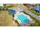 Aerial shot of community pool featuring well-maintained landscaping and parking at 3963 Harmattan Dr, Denver, NC 28037