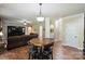 Dining area with access to the kitchen and living room at 3963 Harmattan Dr, Denver, NC 28037