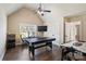 Spacious game room with ping pong table, air hockey, arcade game and adjacent closet at 3963 Harmattan Dr, Denver, NC 28037