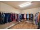 Large walk-in closet with custom shelving and storage for your wardrobe at 3963 Harmattan Dr, Denver, NC 28037