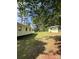 View of the backyard with green shed at 418 Cedar Grove Rd, Clover, SC 29710