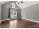 Inviting bedroom with a vaulted ceiling, ceiling fan, and ample natural light at 4218 Ash Hollow Ln, Denver, NC 28037