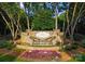 Elegant Sail View community entrance featuring a stone fountain and lush landscaping at 4218 Ash Hollow Ln, Denver, NC 28037