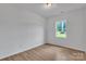 This bedroom is freshly painted with new flooring and great natural light at 516 North Mulberry St, Cherryville, NC 28021