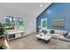 Bright and airy living room with stylish decor, comfortable seating, and lots of light at 516 North Mulberry St, Cherryville, NC 28021