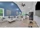 Open-concept living room and kitchen with stylish furnishings and vaulted ceilings at 516 North Mulberry St, Cherryville, NC 28021