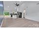 Open-concept living space featuring vaulted ceilings, recessed lighting, and a seamless flow into a modern kitchen at 516 North Mulberry St, Cherryville, NC 28021