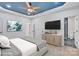Spacious bedroom featuring a tray ceiling, a modern color palette, and an ensuite bathroom at 516 North Mulberry St, Cherryville, NC 28021