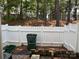 Fenced backyard features a privacy fence, brick pavers, and green space at 5650 Kimmerly Woods Dr, Charlotte, NC 28215