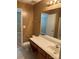 Neutral bathroom featuring tile flooring, neutral walls, and single sink vanity at 5650 Kimmerly Woods Dr, Charlotte, NC 28215