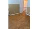 Cozy bedroom with hardwood floors, neutral walls, and closet at 5650 Kimmerly Woods Dr, Charlotte, NC 28215