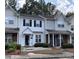 Charming two-story townhouse with manicured landscaping and a welcoming entrance at 5650 Kimmerly Woods Dr, Charlotte, NC 28215