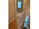 View of a staircase with white railings and carpeted steps, leading to different levels of the home at 5650 Kimmerly Woods Dr, Charlotte, NC 28215