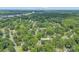 Lush, mature trees surround 5720 Amity Place, with a view of Uptown Charlotte in the distance at 5720 Amity Pl, Charlotte, NC 28212