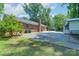 Large backyard of brick home at 5720 Amity Pl, Charlotte, NC 28212