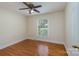 Bedroom featuring hardwood flooring and a window at 5720 Amity Pl, Charlotte, NC 28212