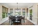 Bright breakfast nook with lots of windows at 5916 Four Wood Dr, Matthews, NC 28104