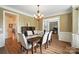 Formal dining room with chandelier and elegant decor at 5916 Four Wood Dr, Matthews, NC 28104