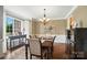 Dining room with hardwood floors and ample natural light at 5916 Four Wood Dr, Matthews, NC 28104