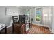 Home office with large desk and natural light at 5916 Four Wood Dr, Matthews, NC 28104