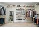 Spacious walk-in closet featuring ample shelving and clothing racks for organization and storage at 5916 Four Wood Dr, Matthews, NC 28104