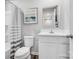 Bright bathroom with a tub/shower combo, white cabinets, and new fixtures offers comfort and style at 5995 Granbury Dr, Kannapolis, NC 28081