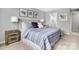 A spacious bedroom boasts modern decor and an ensuite bathroom for a luxurious feel at 5995 Granbury Dr, Kannapolis, NC 28081