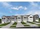 Charming townhomes feature inviting entrances, well-manicured lawns, and private driveways for modern living at 5995 Granbury Dr, Kannapolis, NC 28081