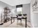 This home office features ample workspace and natural light, creating an ideal work-from-home environment at 5995 Granbury Dr, Kannapolis, NC 28081