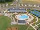 Panoramic aerial view of the tennis courts, pool, and clubhouse, enhancing the community's appeal at 6020 Waldorf Ave, Monroe, NC 28110