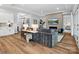 The living room features a tiled fireplace, wall-mounted TV, and lots of natural light at 6020 Waldorf Ave, Monroe, NC 28110