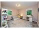 Bright bedroom with natural light, neutral walls, area rug, and storage bed at 617 Pinecrest St, Davidson, NC 28036