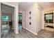 Hallway featuring access to bedrooms, bathrooms, and closets at 617 Pinecrest St, Davidson, NC 28036