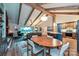 Open concept living, dining, and kitchen area with fireplace and cathedral ceiling at 617 Pinecrest St, Davidson, NC 28036