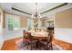 Spacious dining area with natural light and view into the office and entryway at 6422 Northern Red Oak Dr, Mint Hill, NC 28227