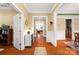 A lovely interior view of the entryway leading to the dining room and living room at 6422 Northern Red Oak Dr, Mint Hill, NC 28227