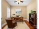 Comfortable office with wood floors, built-in shelves and ample lighting at 6422 Northern Red Oak Dr, Mint Hill, NC 28227