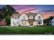 Attractive home showcasing refined exterior with a manicured lawn and inviting entrance at 6505 Folger Dr, Charlotte, NC 28270