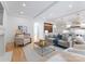 This living room features recessed lighting, a fireplace, and a connected kitchen at 6505 Folger Dr, Charlotte, NC 28270