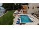Aerial view of the beautiful backyard pool, patio, and lake access at 8170 Bay Pointe Dr, Denver, NC 28037