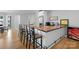 Bar area with stools, custom counter, and beverage center at 8170 Bay Pointe Dr, Denver, NC 28037