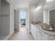 Bathroom with lake views, double vanity, and walk-in shower at 8170 Bay Pointe Dr, Denver, NC 28037