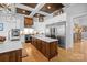 Chef's kitchen with custom cabinets, a center island, and state-of-the-art appliances, perfect for entertaining at 8170 Bay Pointe Dr, Denver, NC 28037