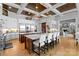 Gourmet kitchen with quartz countertops, a large island, stainless steel appliances and coffered ceilings at 8170 Bay Pointe Dr, Denver, NC 28037