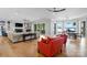Spacious living room with large windows, fireplace, and open floor plan at 8170 Bay Pointe Dr, Denver, NC 28037