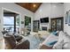 Bright open living room with fireplace and lake views at 8170 Bay Pointe Dr, Denver, NC 28037