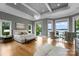 Spacious main bedroom features water views, light gray walls and tray ceilings at 8170 Bay Pointe Dr, Denver, NC 28037