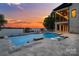 Stunning pool and lake views with dock access, perfect for waterfront living and enjoying sunset vistas at 8170 Bay Pointe Dr, Denver, NC 28037