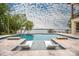 Luxury swimming pool with lake views and integrated lounge chairs at 8170 Bay Pointe Dr, Denver, NC 28037